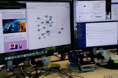 Computer screens on a desk