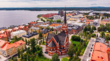 Lulea, Sweden - July 05, 2019: Panorama city, Cathedral sunny day, blue sky.