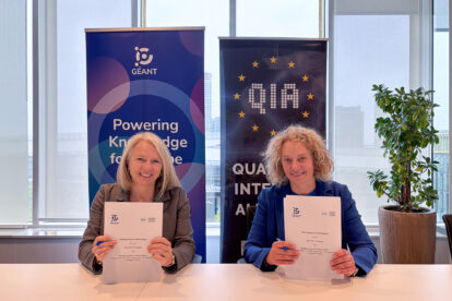 GÉANT CEO Lise Fuhr and QIA Director Stephanie Wehner signing a MoU between the two organisations